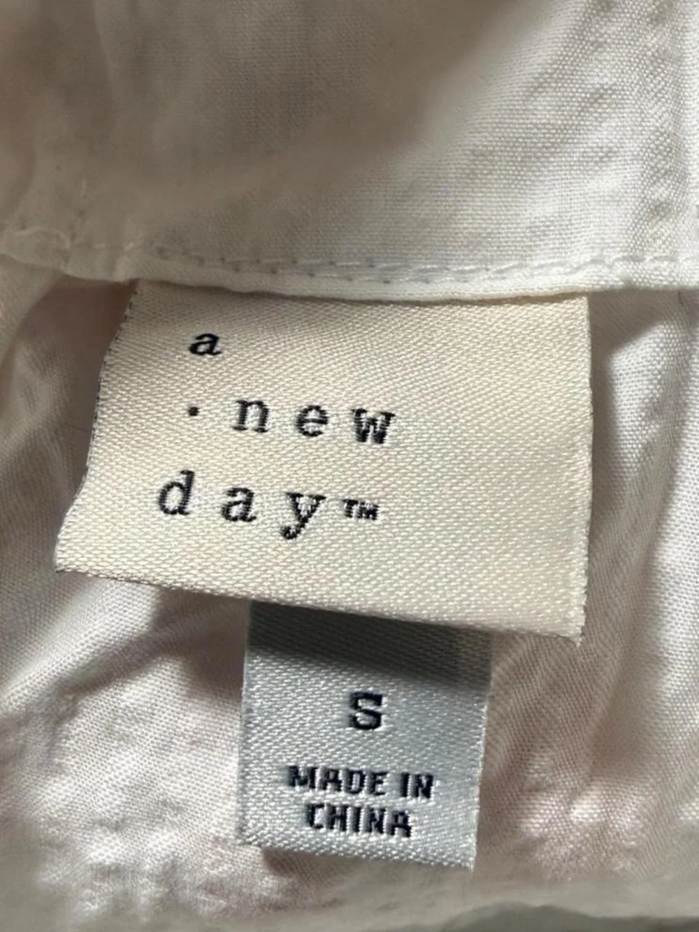 a new day White Sleeveless Chemise Tank